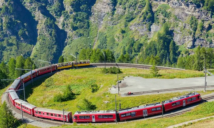 Bernina Scenic Train Unesco ride on the Swiss Alps. SMALL-GROUP
