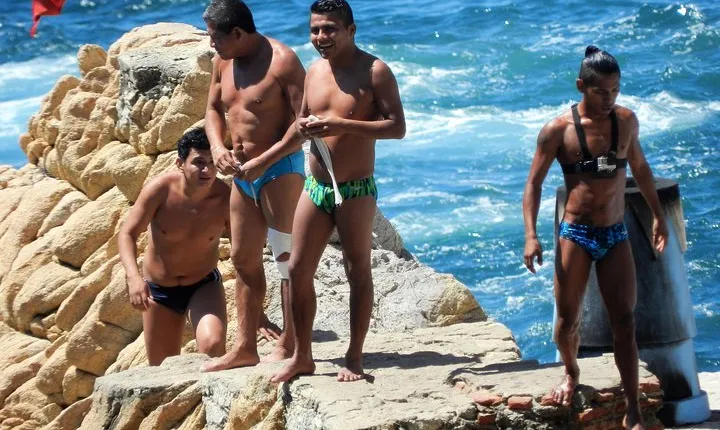 La Quebrada Spectacular: Cliff Diving Show with Dining & Shopping