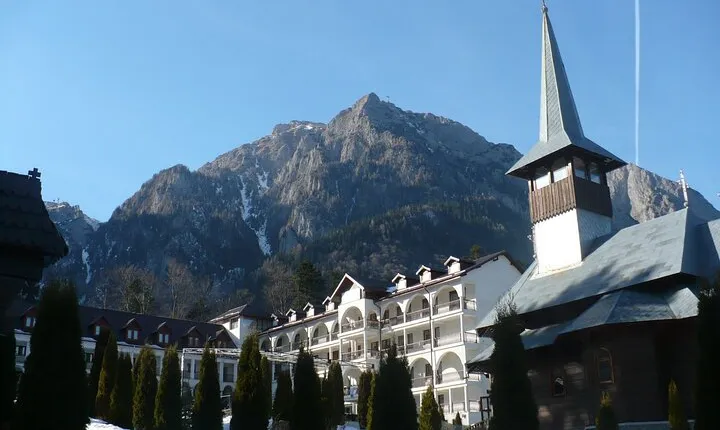 Peles Castle and optional Cantacuzino Castle from Brasov
