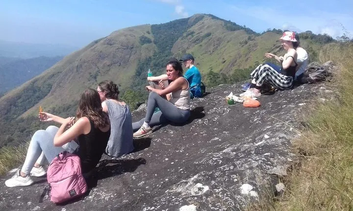 Munnar historical trail- (walk into Tea garden, village & market)