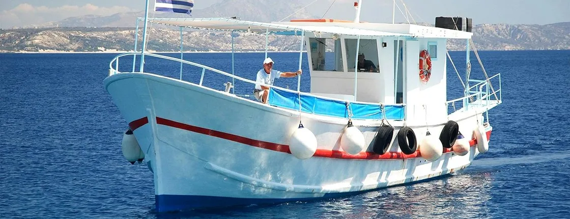 Kefalos Bay boat trip with BBQ lunch and fishing time