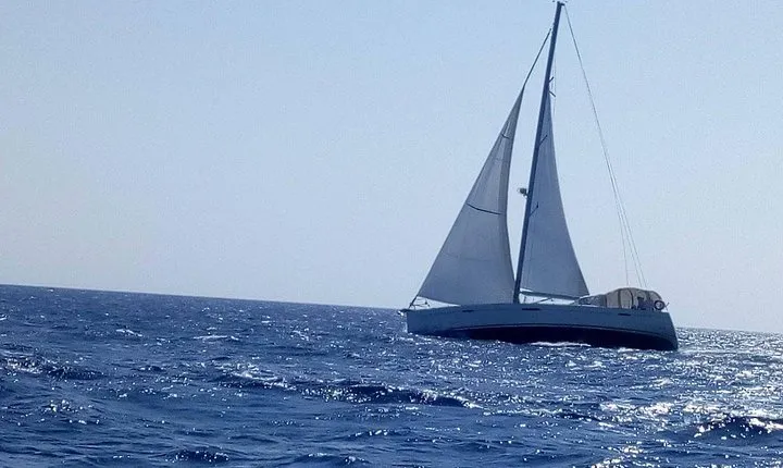 Private Coast to Coast Sailing Trip from Rhodes City