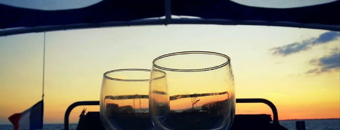 Sailing cruise on a Catamaran at aperitif time from La Rochelle