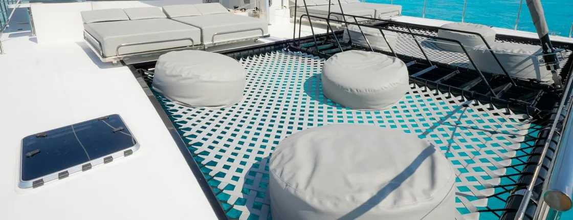 Catamaran cruise to Isla Mujeres with beach club visit and brunch