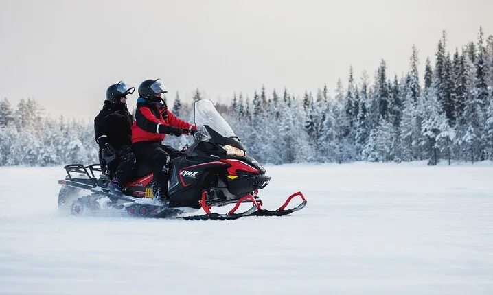 Two hours Snowmobile Safari Driving into Lappish Forests