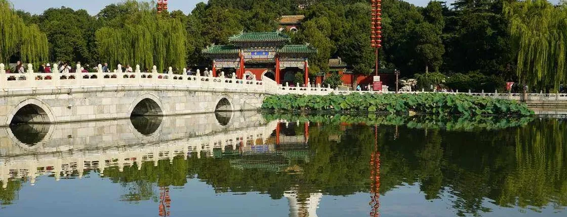 Beihai boat ride, imperial cuisine, and Beijing's old part guided tour
