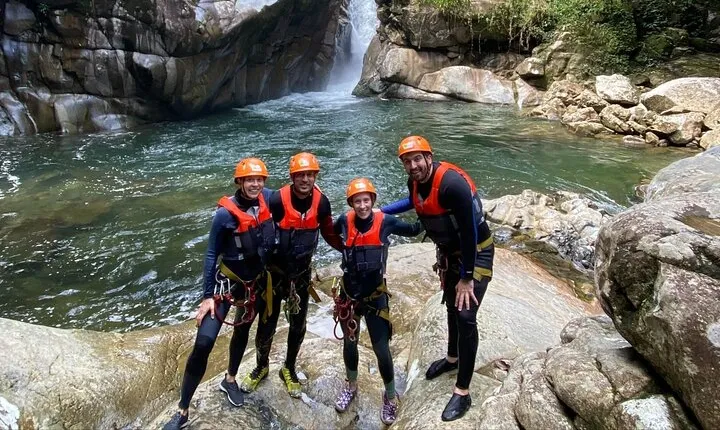 PARAGLIDING OVER GUACAICA JUNGLE AND CANYONING from Guatape