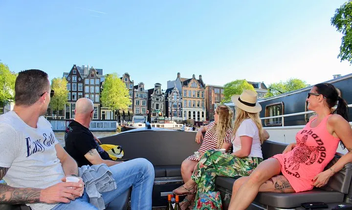 Amsterdam Canal Tour by Open Boat – 90 min Small Group Experience
