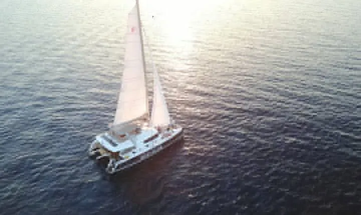 Santorini Luxury Catamaran Sunset Cruise with BBQ, Drink and Transfer