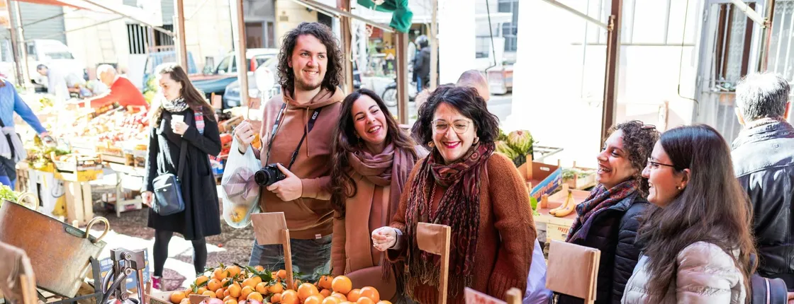 Market tour and dining experience at a Cesarina's home in Messina