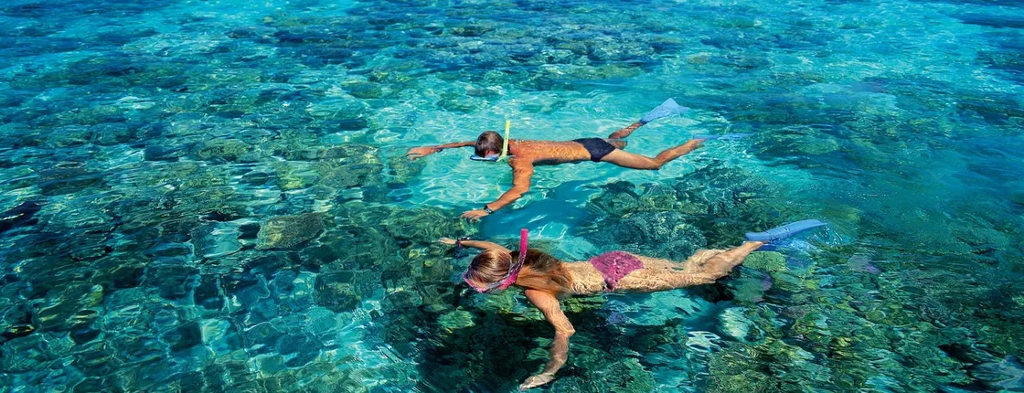 Green Island full-day tour with snorkel gear or glass bottom boat