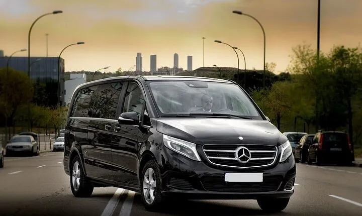 Milan Malpensa Airport MXP Arrival Transfer to Milano City by Van