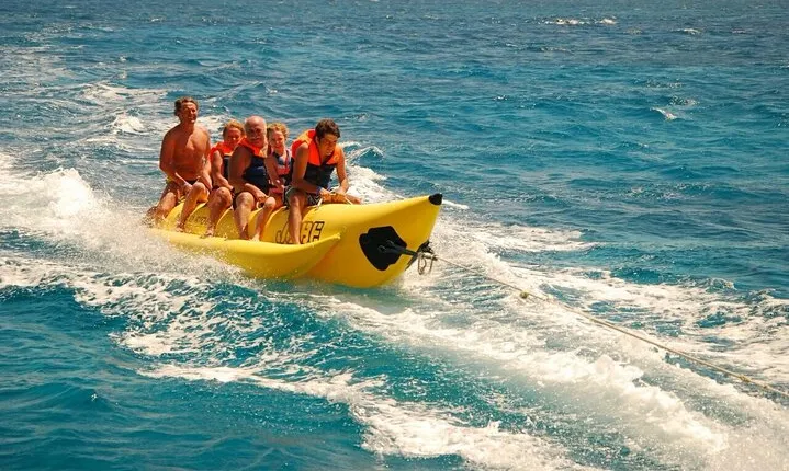 Dolphin tour & banana boat fun with snorkeling from Hurghada