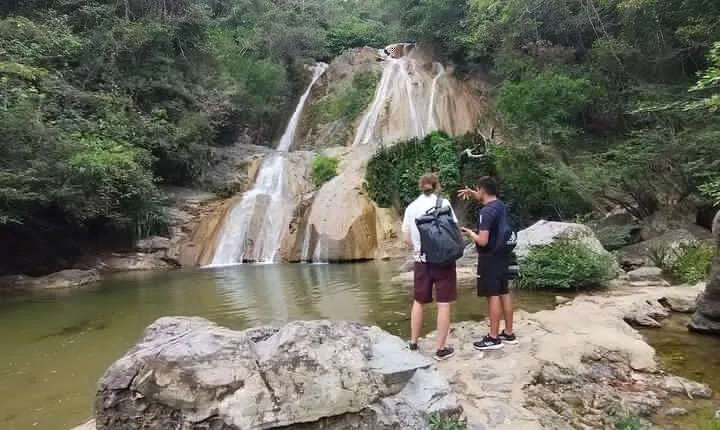 Natural adventure with waterfalls, trails and sunny day