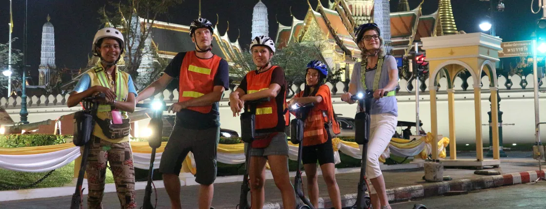 Guided e-scooter night tour with local street food