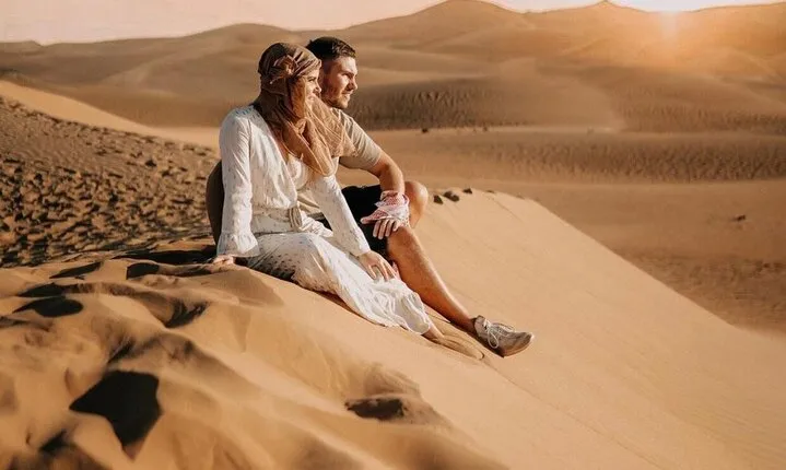 Private Evening Desert Safari with BBQ Dinner, Camel Ride And Sand Boarding