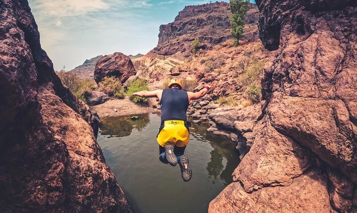 Cliff Jumping Canyoning in The Rainbow Rocks Ravine