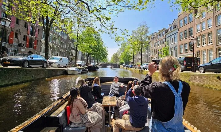 Amsterdam Canal Tour by Open Boat – 90 min Small Group Experience