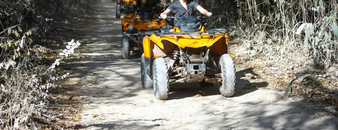 Morning ATV ride, cenote visit and catamaran cruise from Cancun with lunch