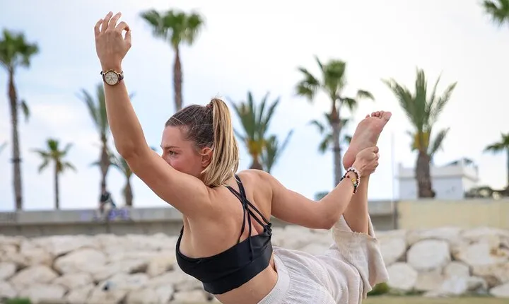Holistic Sunset Beach Yoga Experience in Malaga with Maria