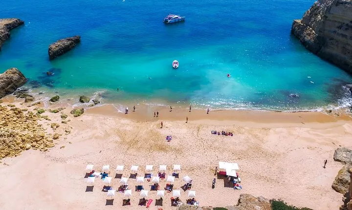 Albufeira Beach BBQ with Caves and Coastline Cruise with Open Bar