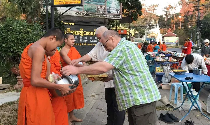 Alms and Wat Phra That Doi Suthep Private Chiang Mai Tour