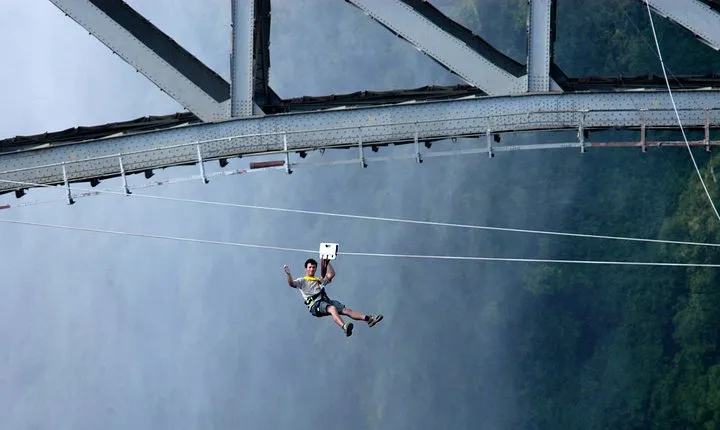Tandem- Zip Line ( Foofie Slide) Victoria Falls Bridge.