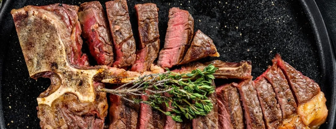 Florentine-style steak cooking experience with a chef and unlimited wine