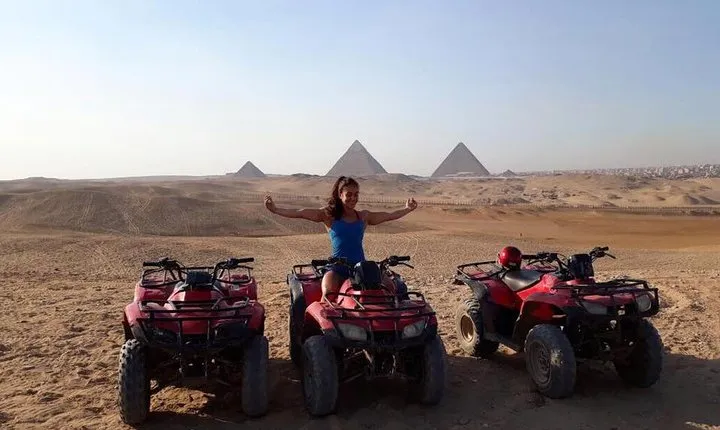 Quad Bike Trip during sunset around Pyramids, evening attend the sound & light show at Giza Pyramids with Dinner