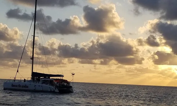 Catamaran Cruise and Bamboo Rafting Limestone Massage Experence