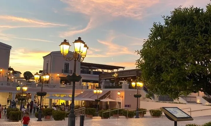 Private Transfer to Shopping Village before flight 4hrs to the Airport