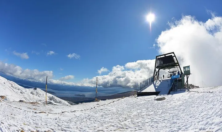 Snow Baptism Adventure: Skiing and Snowboarding at Cerro Catedral