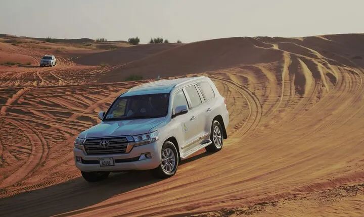 Desert Dune Bashing, Camel Ride, Sandboarding & Inland Sea.