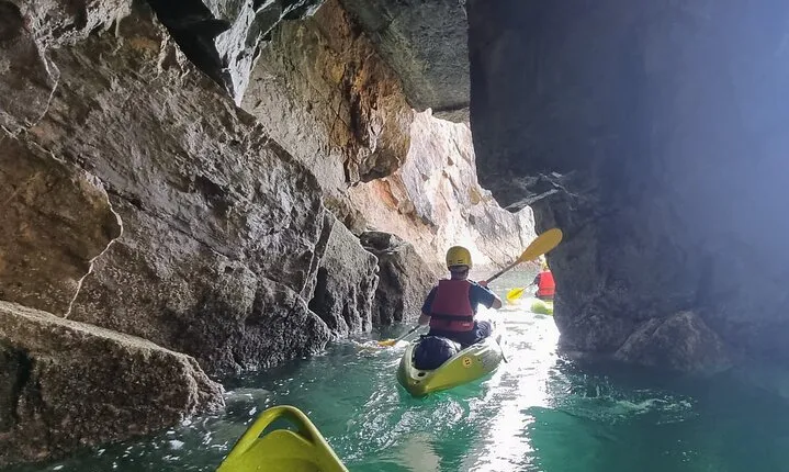 Guided kayaking trip exploring the secrets of the Tenby coastline