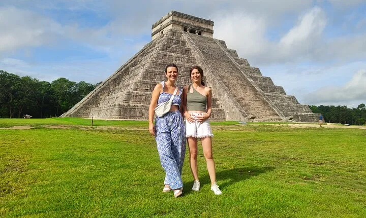 Chichen Itza and cenote in a mayan community