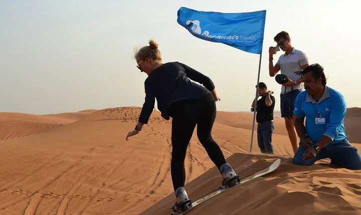 Enjoy The Dubai Fossil Rocks Desert with Sandboarding, Camel Ride,& BBQ Dinner