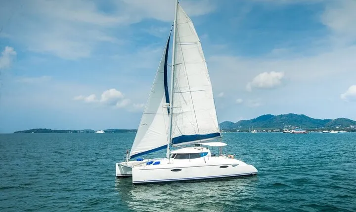 Phuket Catamaran Tour to Coral Island and Sunset Voyage
