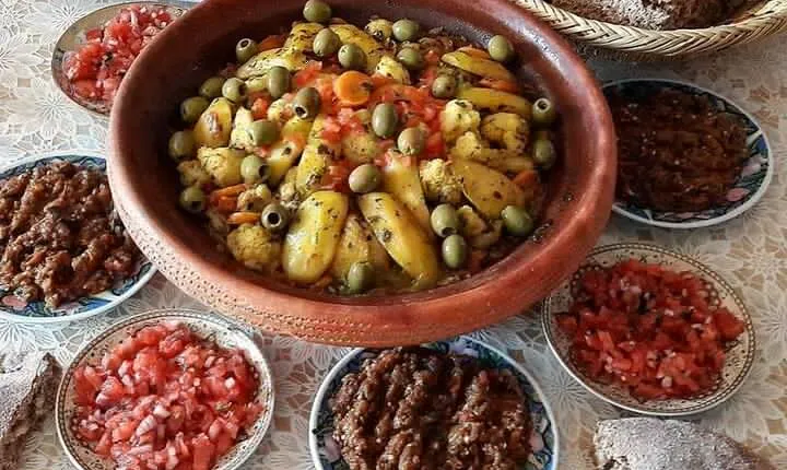 Old local Market visit+Moroccan cooking class with a local family
