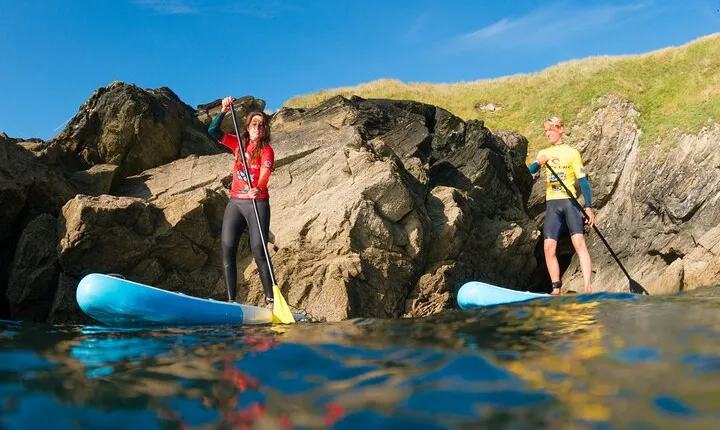 Paddleboarding Around Newquay's Coastline