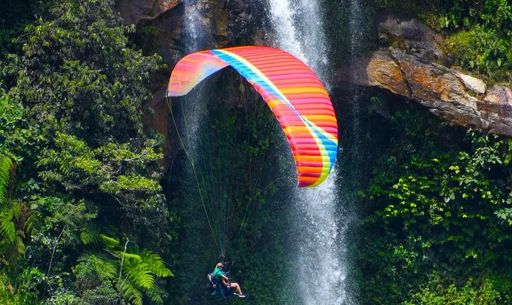 Paragliding and hammocks zipline over waterfalls private tour