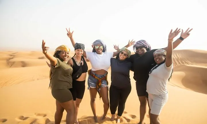 Dubai Half-day Red Dunes bashing with Sandboarding, Camel &Falcon