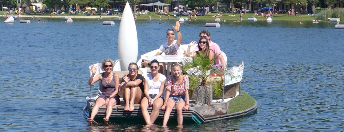 Private e-boat floating island rental on Vienna's Old Danube