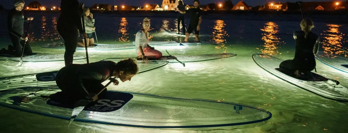 Illuminated glassSUP night tour in Kiel and surrounding areas