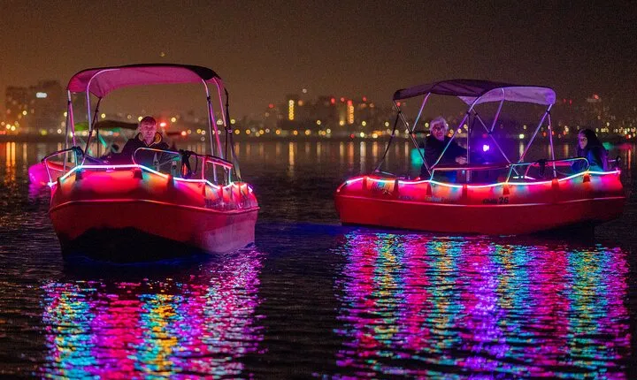 Glow Electric Boat night date experience in San Diego Bay