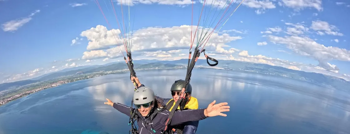 Tandem paragliding over Lake Ohrid with paddleboard session