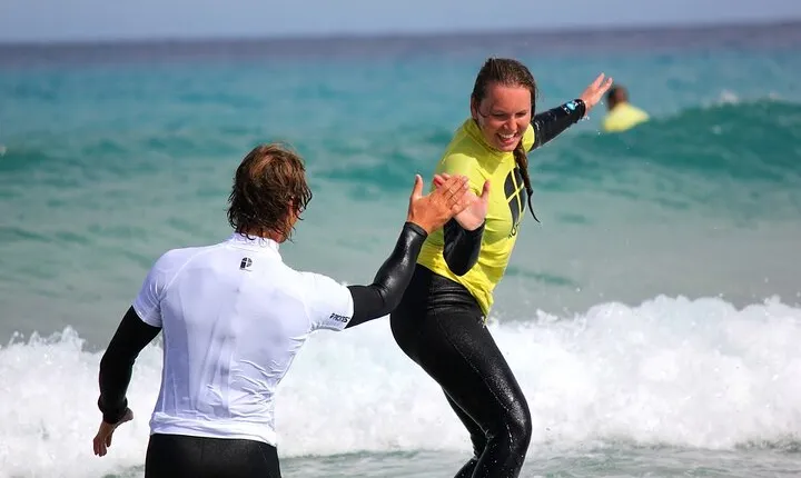 Learn to surf the most beautiful sandy beaches of Fuerteventura