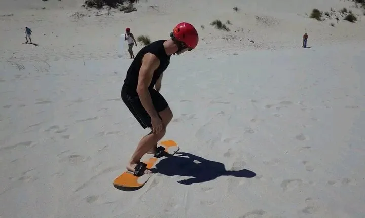 Explore Atlantis Sand Dunes with a 1hour 30mins sandboarding tour