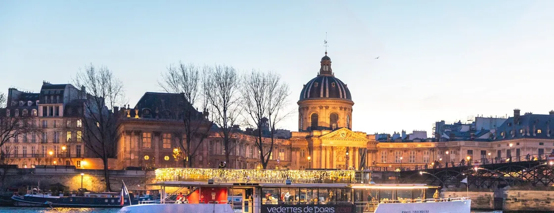 Evening cruise on the Seine river with an aperitif