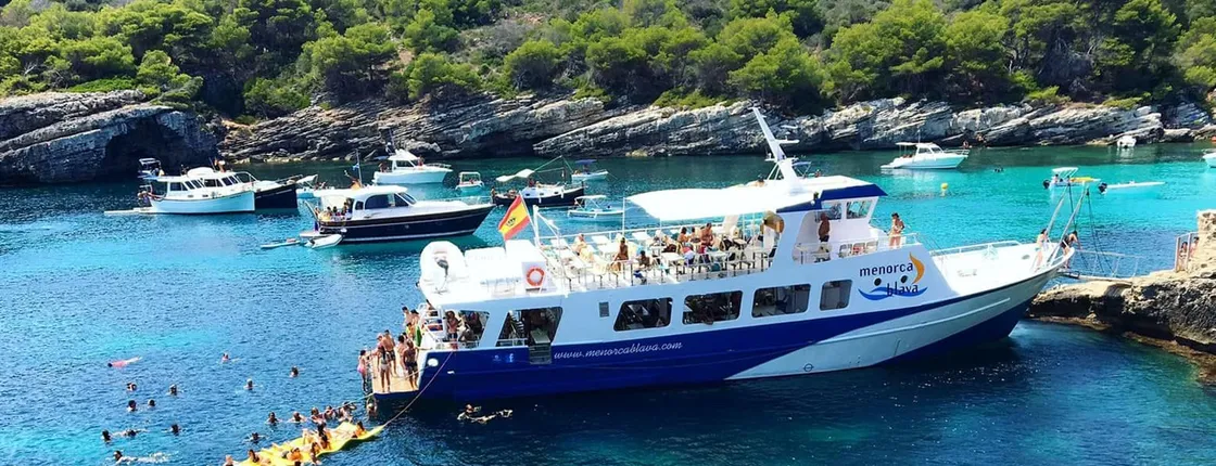 South-west Menorca cruise with paella lunch