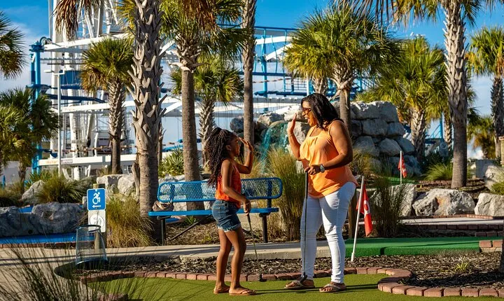 Mini Golf beneath SkyWheel Panama City Beach